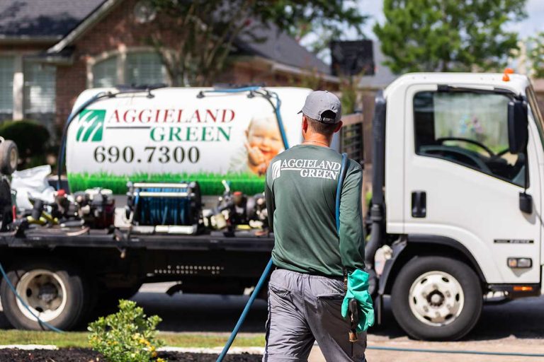 local lawn care company aggieland green treating a texas lawn
